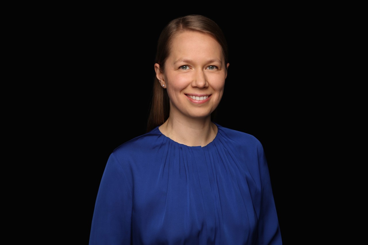 Portrait of Evgenia, energy market analyst in London.